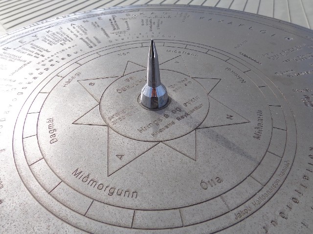 This sundial has got a gnomen but the whole thing's the wrong way round. It's not midnight now.