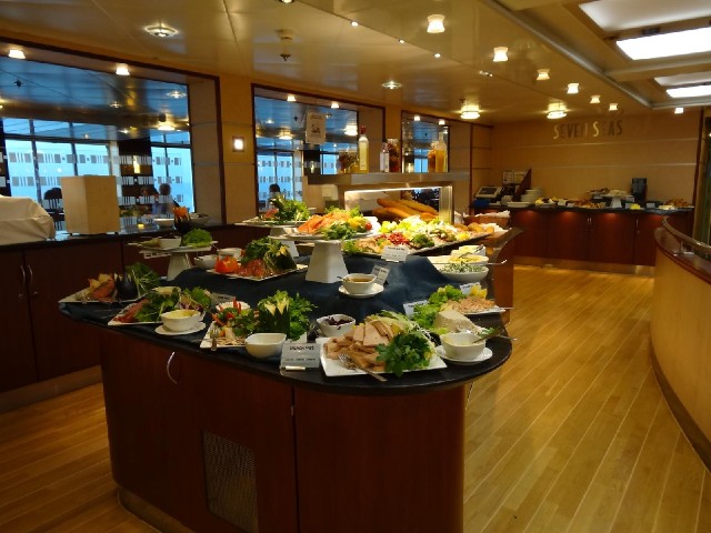 The cold food section of the dinner buffet.