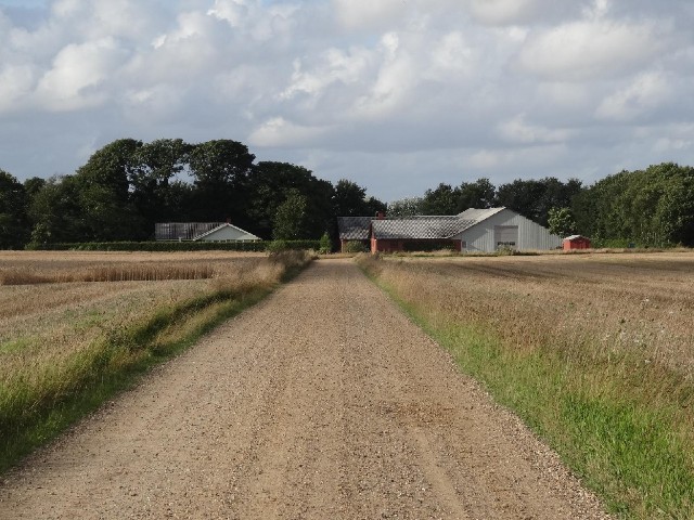 This doesn't look like the road to anywhere except that farm but it is the right way.