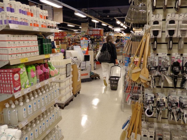 I don't think normal trolleys would fit up the aisles in this supermarket so they use baskets on whe...