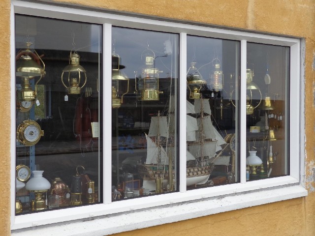 This shop sells maritime equipment but had a selection of antique stuff in one of its windows.