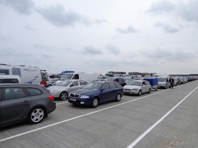 All these vehicles will be going on the ferry. It must be quite full because I couldn't get a room t...