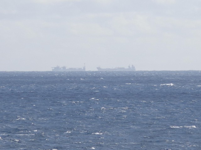 Two ships in the distance.