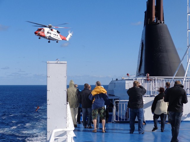 I never did find out what this was all about. The helicopter came out to us from Shetland, followed ...