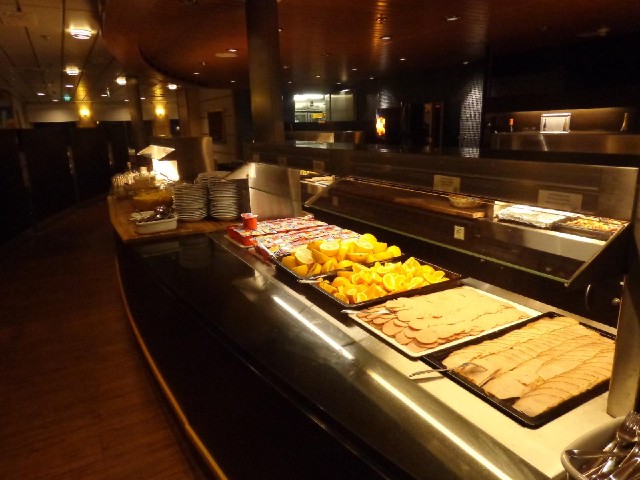 On Mondays, when the ship comes into Trshavn, the breakfast buffet opens early enough to feed the p...