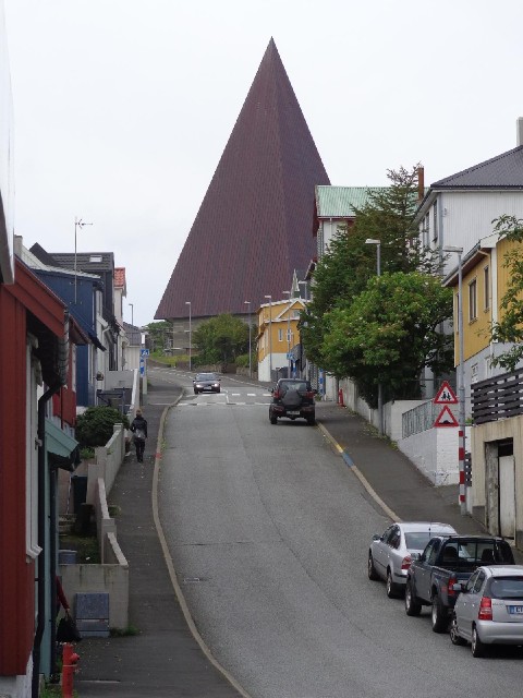 The pointy building is a church.