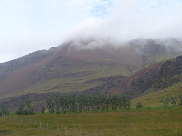 Within a few minutes, the clouds had blown away from around that peak.