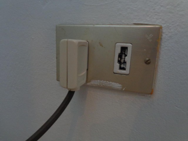 This is an unusual mains socket. The cable leads to a trailing gang of conventional European sockets...