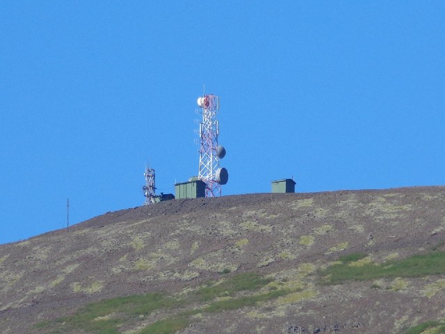 A mast on a mountain.