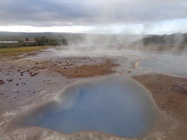 Some of the boiling pools here are brown, some are grey and some are a deep blue like this one.