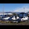 A car wash, with mist rolling over the mountains in the distance.