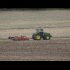 A tractor and some birds.