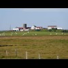 Another farm. The mast on the left is in Hvolsvllur, my destination for tonight. I'm glad I'm nearl...