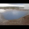 Cold rain falling on the surface of a boiling hot pool.
