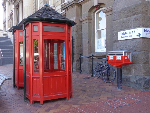 Phone boxes and post boxes.