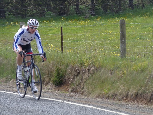 Another cyclist. A few minutes ago, one came down the hill, stopped just short of where I was, turne...