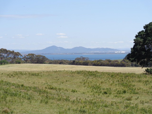 The view across Corio Bay. The white buildings on the right are hangars at Avalon Airfield.