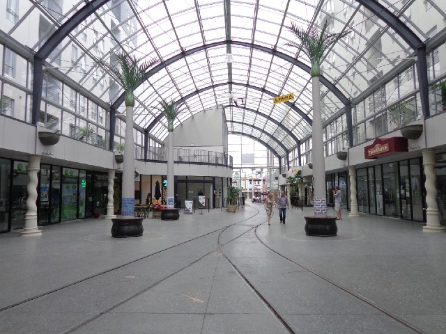 Inside. It's probably easier for people to shop in here now that there are no trams.