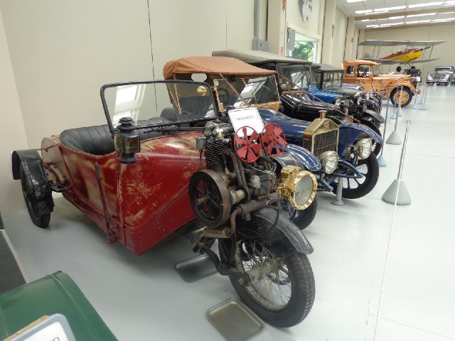 This is a strange-looking car, as is the one in the distance whose body is made entirely from copper...