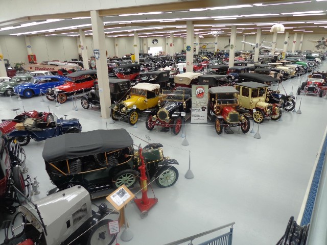 Quite a lot of cars. There are more downstairs.