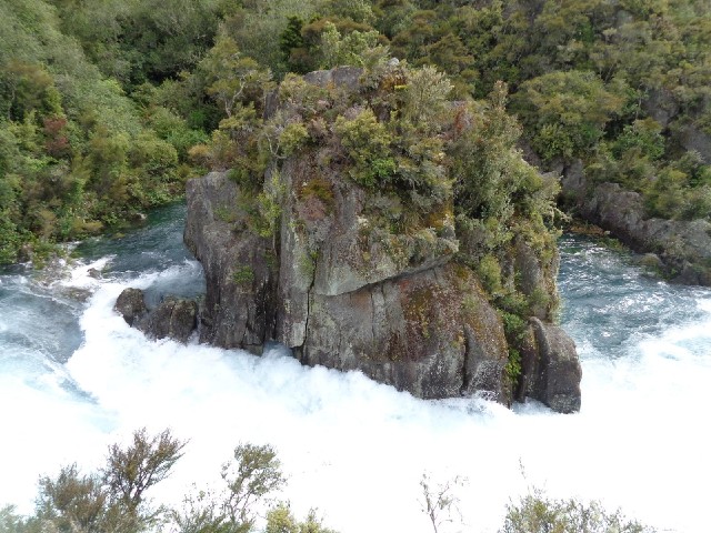 Some of the water is forcing its way through a tunnel through that rock.