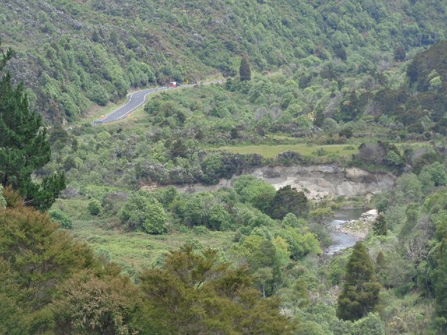 The road and river in the bottom of the valley.