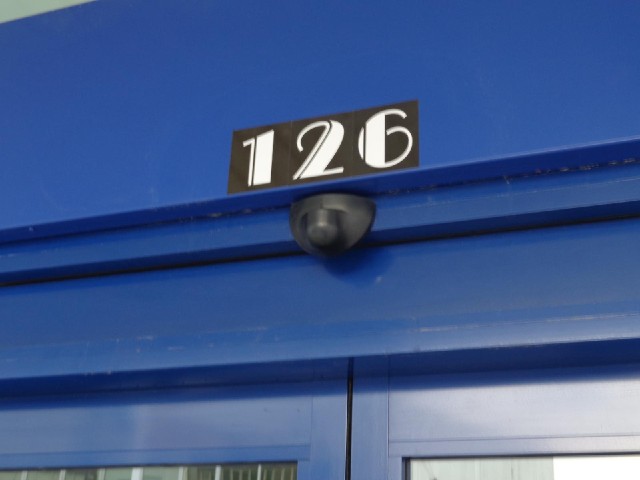 The street number on a bank.