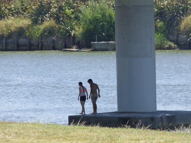 People playing in the river.