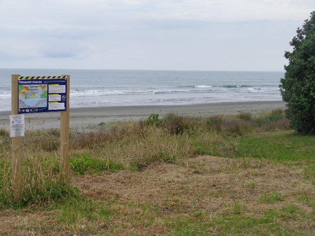 The notice board gives information about the danger from tsunamis.