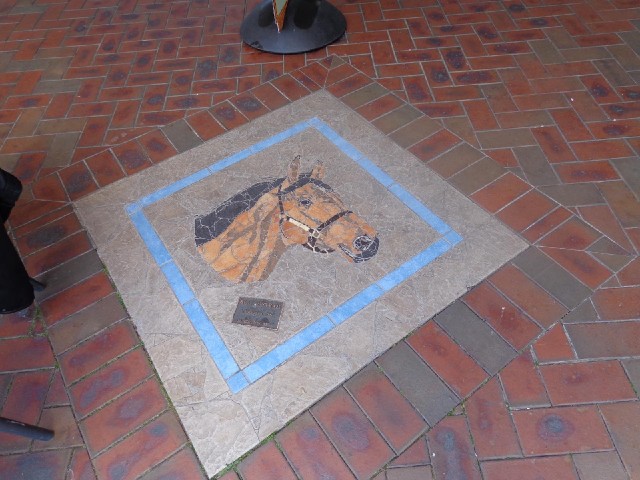The main street here has mosaics depicting famous horses.