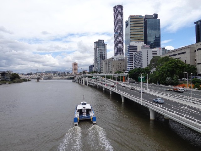the Brisbane River with one of the CityCat ferries.