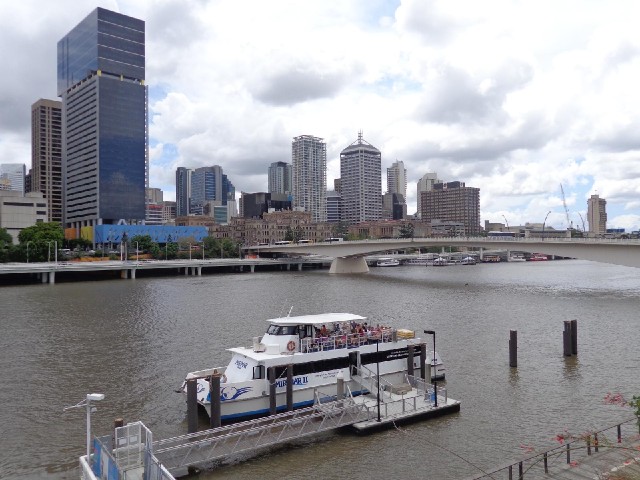 The boat in the foreground takes visitors to a place on the edge of the city which has koalas.