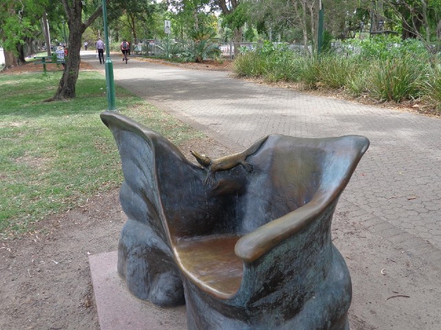 A platypus sculpture on a bidirectional chair.