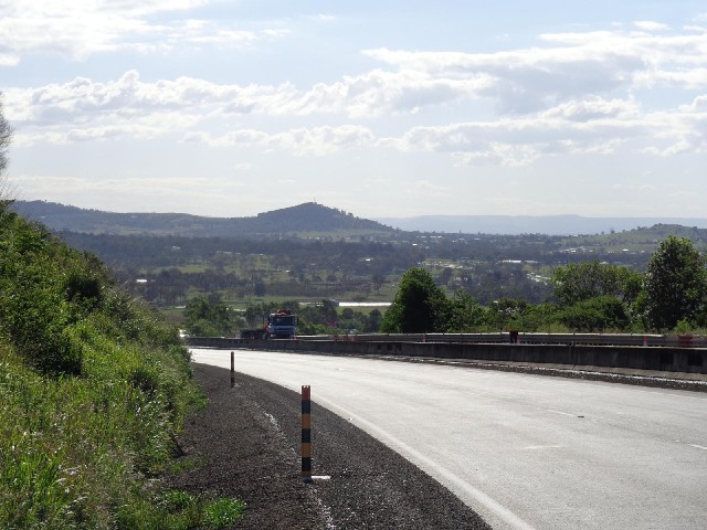 A view from a hill on the main road.
