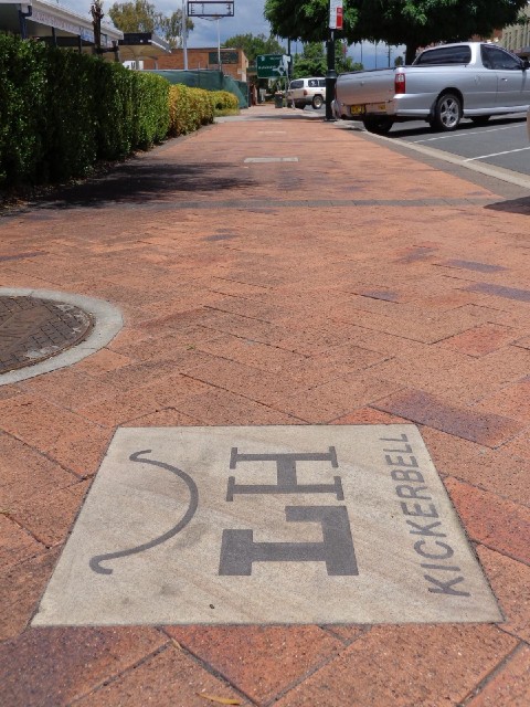 All along the main street in Quirindi, there are paving slabs like these, each with a weird symbol a...