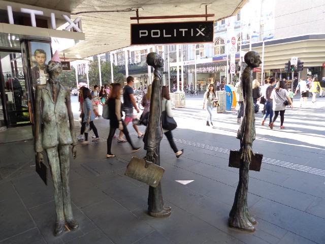 The statue on the left is wearing a party hat.