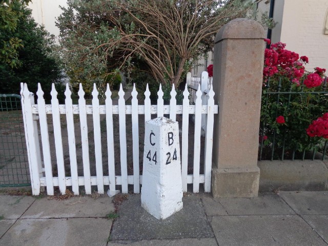 Here's one of those very succinct distance markers that Australia has, but dating from the time when...