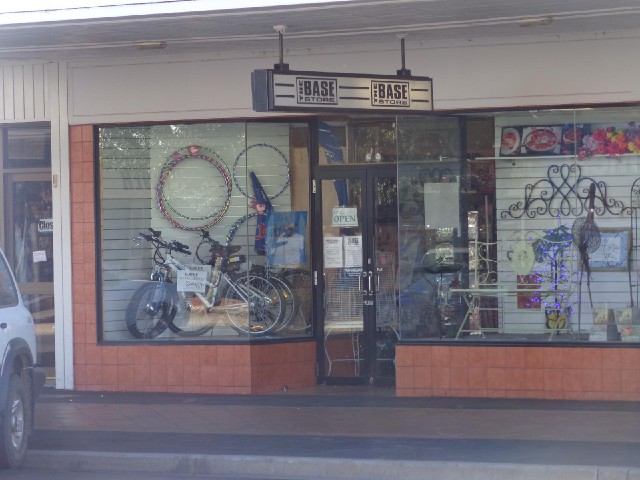 This hardware shop has electric bikes in the window, and some hoops which for a moment I thought cou...