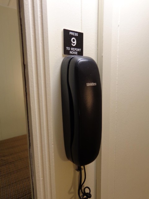 The telephone in my room has an unusually specific purpose.