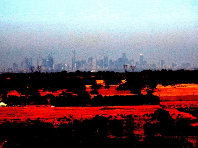 Melbourne, 33 km away. I've had to tinker with the contrast a bit to make it visible through the haz...