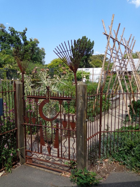 The gate of the garden at Observatory House is made of gardening implements.