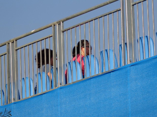 Here are some people really watching the tennis.