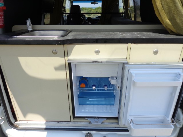 There is an inverter which powers this fridge but the other mains sockets in the van only work if th...