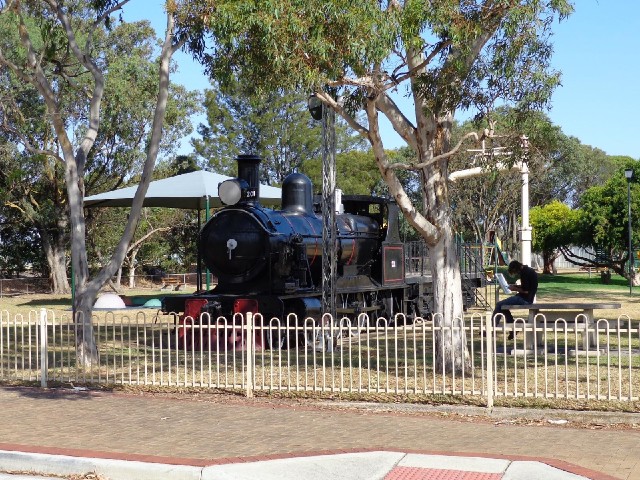 A steam engine in a playground near the station.