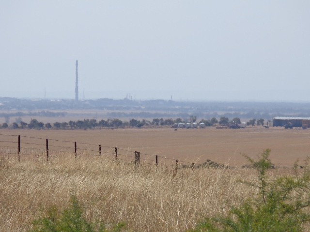A distant chimney.
