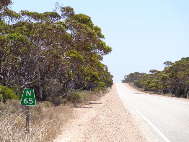 From here on, there are no villages so these signs count down the kilometres to roadhouses. A roadho...