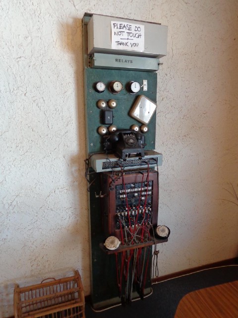 Old telephone equipment. Because a roadhouse is the only building in a settlement, it has to contain...