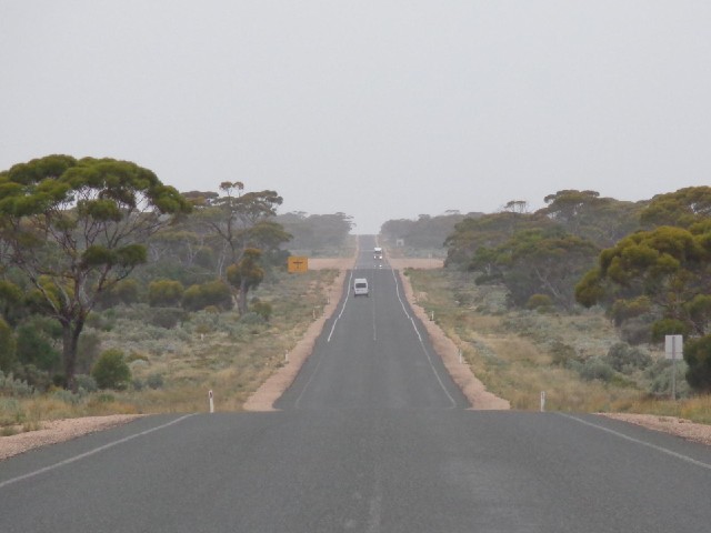 The section of road between where the two vehicles are is another flying doctor runway....