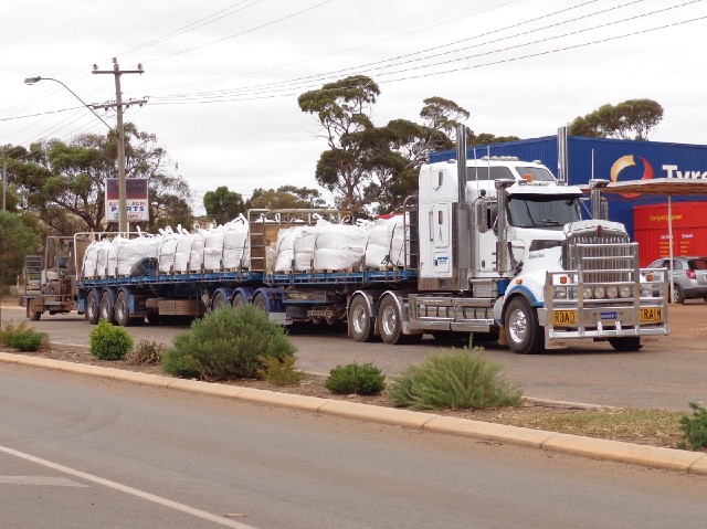 This is an unusual road train. It has two matching units and then a completely different type of tra...