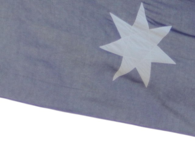 The star on the big flag.